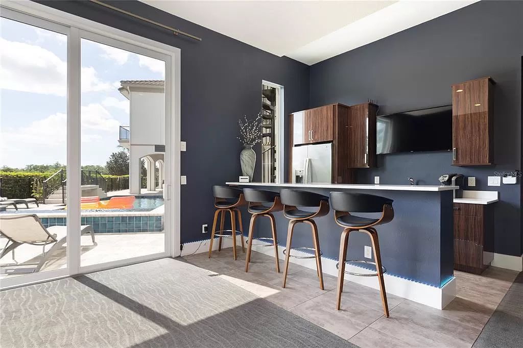 Welcome to Kempa Park, a luxurious 12-bedroom, 16-bathroom vacation retreat situated on the 6th hole of the Jack Nicklaus-designed golf course at Reunion Resort and Club.