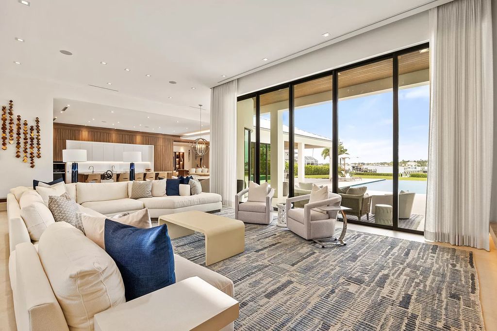 Nestled on the scenic Loxahatchee River, this 5-bedroom, 6-bathroom estate in Jupiter, Florida offers the epitome of luxury living.