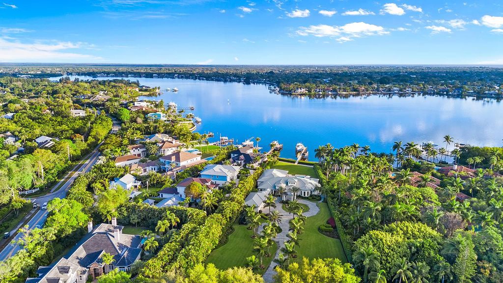 Nestled on the scenic Loxahatchee River, this 5-bedroom, 6-bathroom estate in Jupiter, Florida offers the epitome of luxury living.