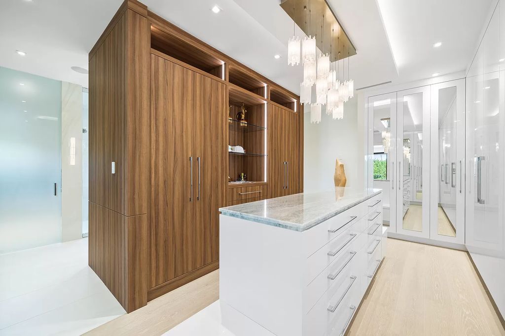 Nestled on the scenic Loxahatchee River, this 5-bedroom, 6-bathroom estate in Jupiter, Florida offers the epitome of luxury living.