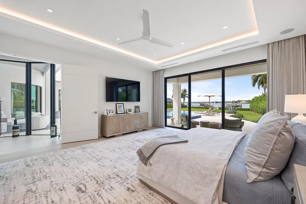 Nestled on the scenic Loxahatchee River, this 5-bedroom, 6-bathroom estate in Jupiter, Florida offers the epitome of luxury living.