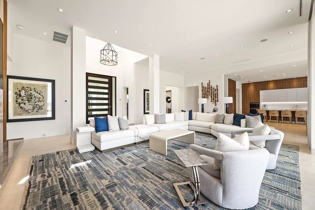 Nestled on the scenic Loxahatchee River, this 5-bedroom, 6-bathroom estate in Jupiter, Florida offers the epitome of luxury living.