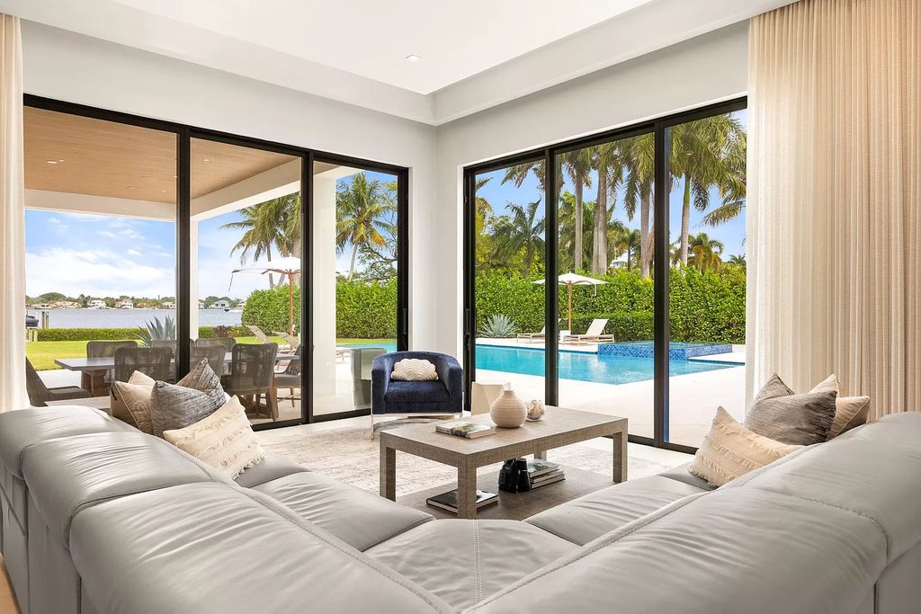 Nestled on the scenic Loxahatchee River, this 5-bedroom, 6-bathroom estate in Jupiter, Florida offers the epitome of luxury living.