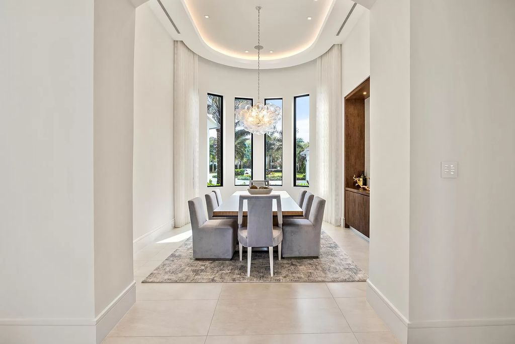 Nestled on the scenic Loxahatchee River, this 5-bedroom, 6-bathroom estate in Jupiter, Florida offers the epitome of luxury living.