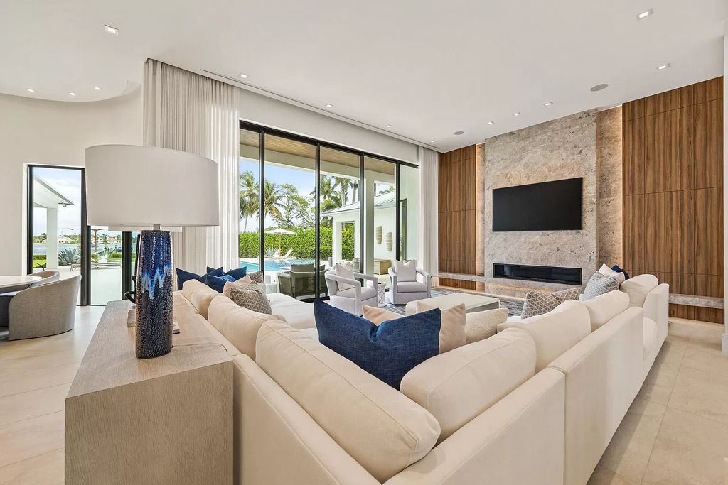 Nestled on the scenic Loxahatchee River, this 5-bedroom, 6-bathroom estate in Jupiter, Florida offers the epitome of luxury living.