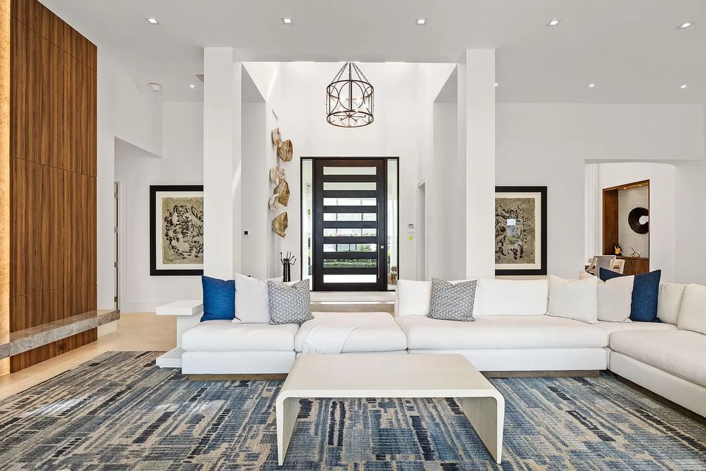 Nestled on the scenic Loxahatchee River, this 5-bedroom, 6-bathroom estate in Jupiter, Florida offers the epitome of luxury living.