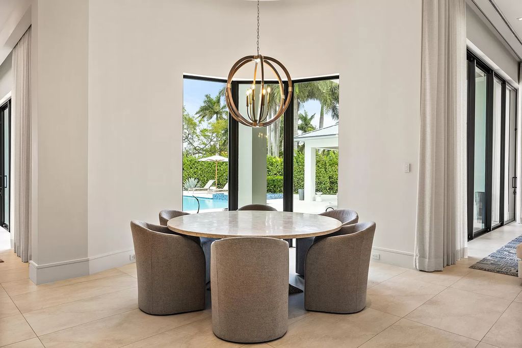 Nestled on the scenic Loxahatchee River, this 5-bedroom, 6-bathroom estate in Jupiter, Florida offers the epitome of luxury living.