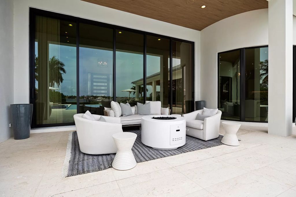 Nestled on the scenic Loxahatchee River, this 5-bedroom, 6-bathroom estate in Jupiter, Florida offers the epitome of luxury living.