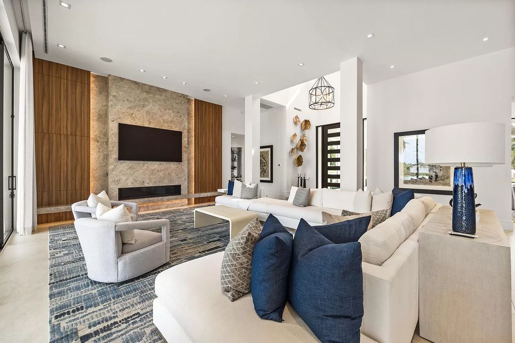 Nestled on the scenic Loxahatchee River, this 5-bedroom, 6-bathroom estate in Jupiter, Florida offers the epitome of luxury living.