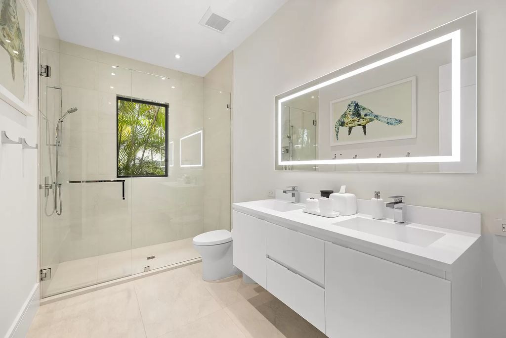 Nestled on the scenic Loxahatchee River, this 5-bedroom, 6-bathroom estate in Jupiter, Florida offers the epitome of luxury living.