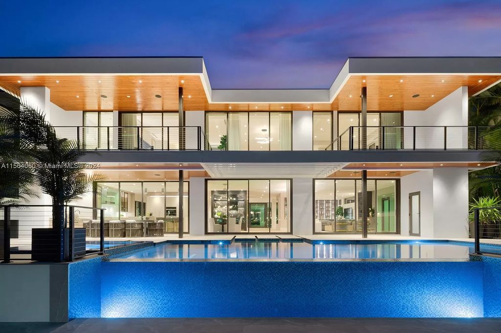 Experience unparalleled luxury living in this newly constructed modern waterfront estate located in Fort Lauderdale. With a Certificate of Occupancy issued and available turnkey, this stunning property boasts enchanting views of the intracoastal, ocean inlet, and passing cruise ships and yachts.