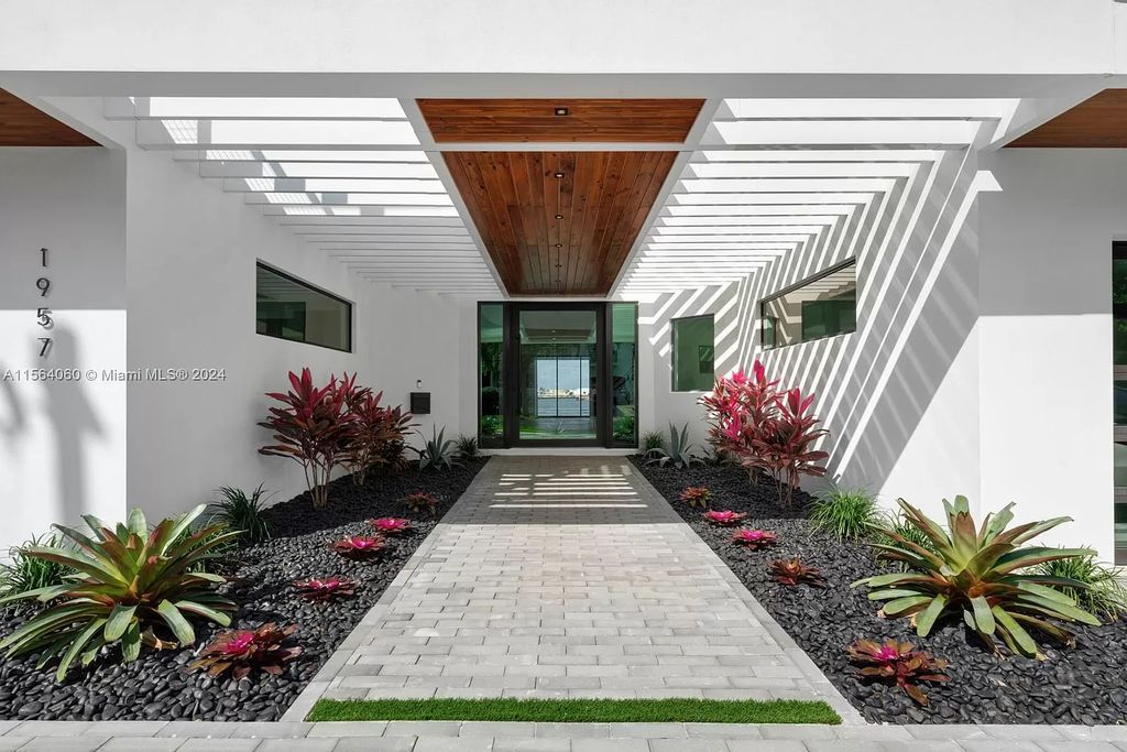 Experience unparalleled luxury living in this newly constructed modern waterfront estate located in Fort Lauderdale. With a Certificate of Occupancy issued and available turnkey, this stunning property boasts enchanting views of the intracoastal, ocean inlet, and passing cruise ships and yachts.