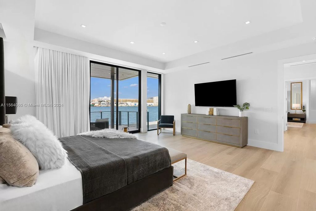 Experience unparalleled luxury living in this newly constructed modern waterfront estate located in Fort Lauderdale. With a Certificate of Occupancy issued and available turnkey, this stunning property boasts enchanting views of the intracoastal, ocean inlet, and passing cruise ships and yachts.