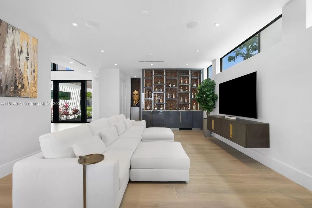Experience unparalleled luxury living in this newly constructed modern waterfront estate located in Fort Lauderdale. With a Certificate of Occupancy issued and available turnkey, this stunning property boasts enchanting views of the intracoastal, ocean inlet, and passing cruise ships and yachts.