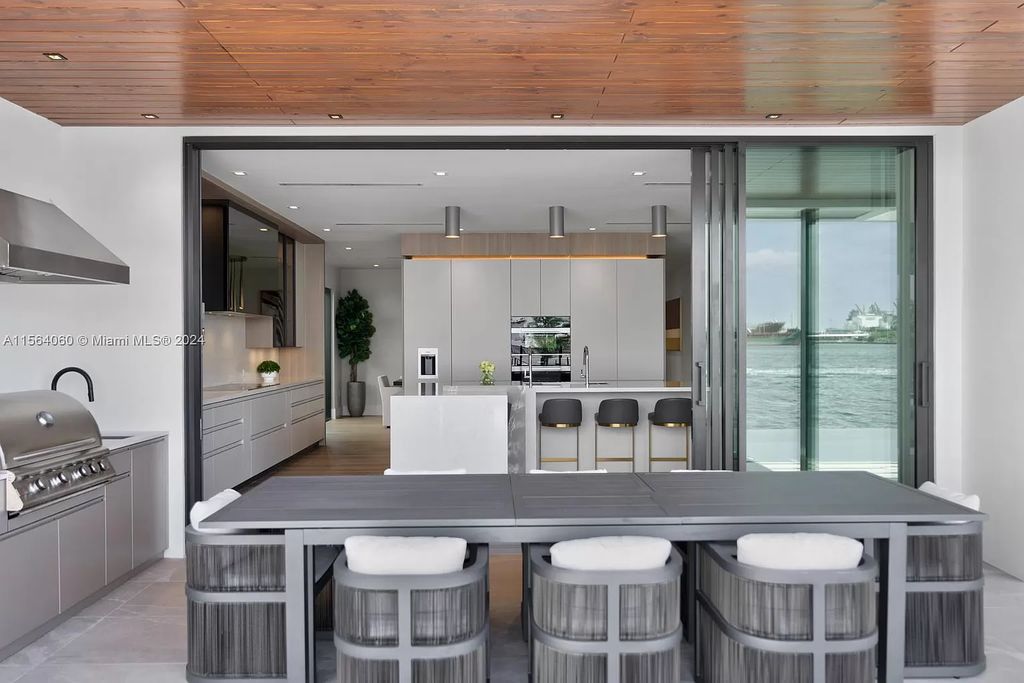 Experience unparalleled luxury living in this newly constructed modern waterfront estate located in Fort Lauderdale. With a Certificate of Occupancy issued and available turnkey, this stunning property boasts enchanting views of the intracoastal, ocean inlet, and passing cruise ships and yachts.