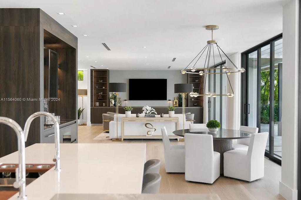 Experience unparalleled luxury living in this newly constructed modern waterfront estate located in Fort Lauderdale. With a Certificate of Occupancy issued and available turnkey, this stunning property boasts enchanting views of the intracoastal, ocean inlet, and passing cruise ships and yachts.