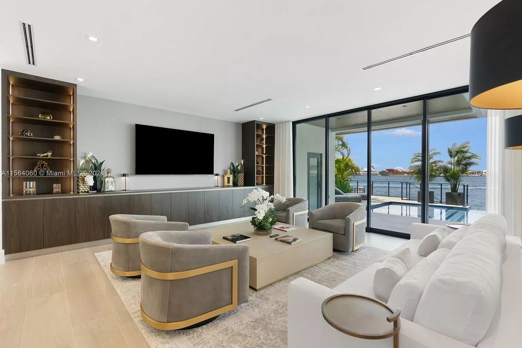 Experience unparalleled luxury living in this newly constructed modern waterfront estate located in Fort Lauderdale. With a Certificate of Occupancy issued and available turnkey, this stunning property boasts enchanting views of the intracoastal, ocean inlet, and passing cruise ships and yachts.