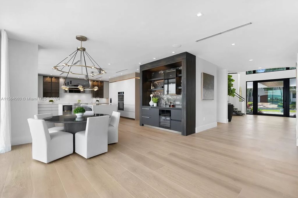 Experience unparalleled luxury living in this newly constructed modern waterfront estate located in Fort Lauderdale. With a Certificate of Occupancy issued and available turnkey, this stunning property boasts enchanting views of the intracoastal, ocean inlet, and passing cruise ships and yachts.