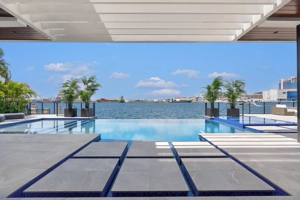 Experience unparalleled luxury living in this newly constructed modern waterfront estate located in Fort Lauderdale. With a Certificate of Occupancy issued and available turnkey, this stunning property boasts enchanting views of the intracoastal, ocean inlet, and passing cruise ships and yachts.