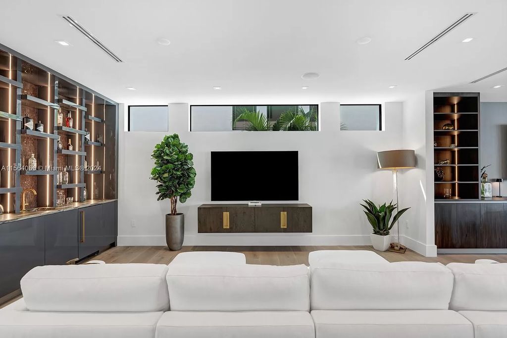 Experience unparalleled luxury living in this newly constructed modern waterfront estate located in Fort Lauderdale. With a Certificate of Occupancy issued and available turnkey, this stunning property boasts enchanting views of the intracoastal, ocean inlet, and passing cruise ships and yachts.