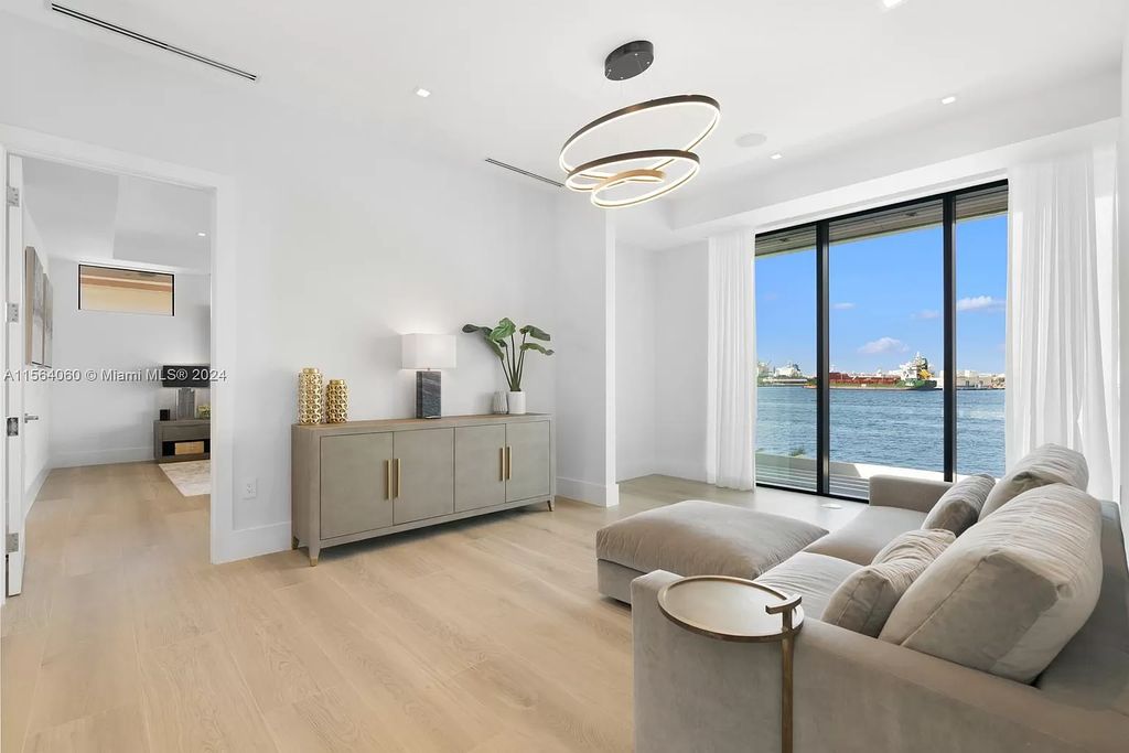 Experience unparalleled luxury living in this newly constructed modern waterfront estate located in Fort Lauderdale. With a Certificate of Occupancy issued and available turnkey, this stunning property boasts enchanting views of the intracoastal, ocean inlet, and passing cruise ships and yachts.