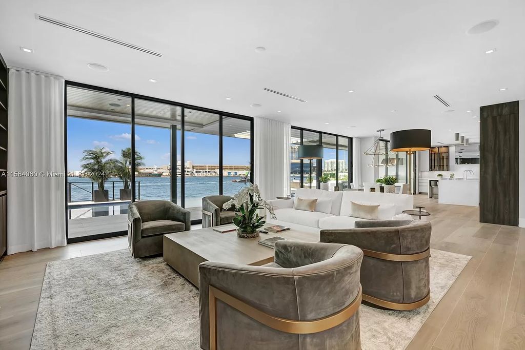 Experience unparalleled luxury living in this newly constructed modern waterfront estate located in Fort Lauderdale. With a Certificate of Occupancy issued and available turnkey, this stunning property boasts enchanting views of the intracoastal, ocean inlet, and passing cruise ships and yachts.