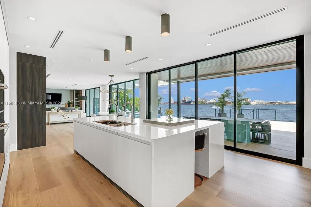 Experience unparalleled luxury living in this newly constructed modern waterfront estate located in Fort Lauderdale. With a Certificate of Occupancy issued and available turnkey, this stunning property boasts enchanting views of the intracoastal, ocean inlet, and passing cruise ships and yachts.