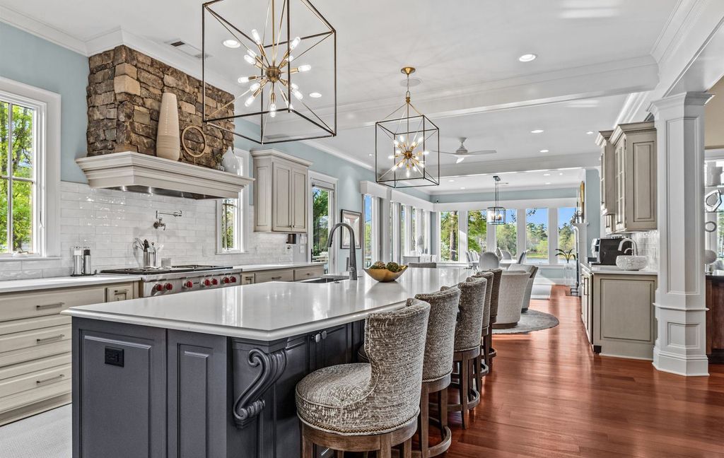 1461 North Shore Drive Home in Greensboro, Georgia. Discover unmatched luxury at this stunning family lake house near the Ritz and LakeClub. Enjoy expansive lake views, resort-style infinity pool, 4-car garage, spacious suites, two kitchens, and an elevator. 