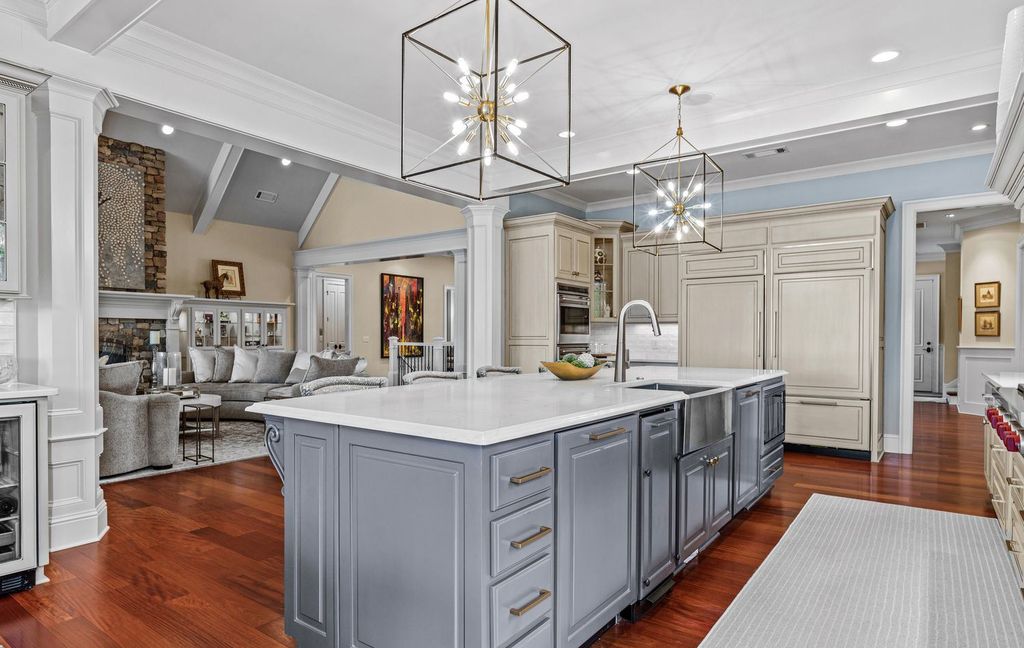 1461 North Shore Drive Home in Greensboro, Georgia. Discover unmatched luxury at this stunning family lake house near the Ritz and LakeClub. Enjoy expansive lake views, resort-style infinity pool, 4-car garage, spacious suites, two kitchens, and an elevator. 
