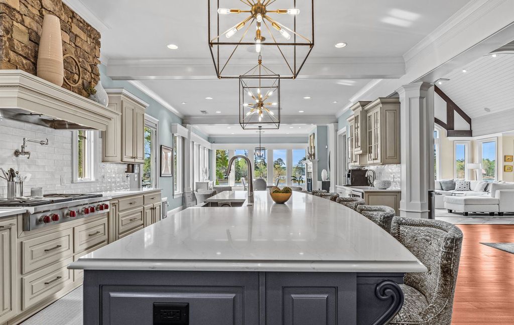 1461 North Shore Drive Home in Greensboro, Georgia. Discover unmatched luxury at this stunning family lake house near the Ritz and LakeClub. Enjoy expansive lake views, resort-style infinity pool, 4-car garage, spacious suites, two kitchens, and an elevator. 