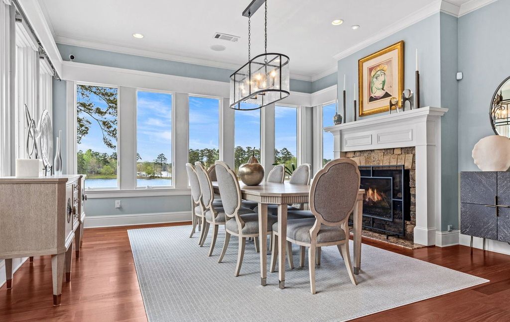 1461 North Shore Drive Home in Greensboro, Georgia. Discover unmatched luxury at this stunning family lake house near the Ritz and LakeClub. Enjoy expansive lake views, resort-style infinity pool, 4-car garage, spacious suites, two kitchens, and an elevator. 