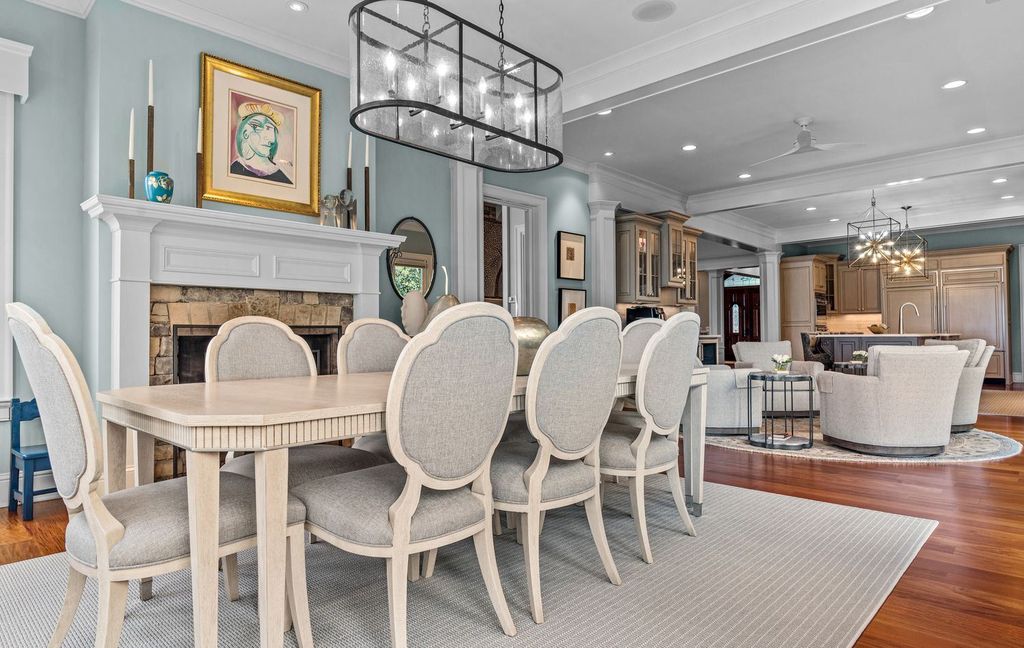 1461 North Shore Drive Home in Greensboro, Georgia. Discover unmatched luxury at this stunning family lake house near the Ritz and LakeClub. Enjoy expansive lake views, resort-style infinity pool, 4-car garage, spacious suites, two kitchens, and an elevator. 