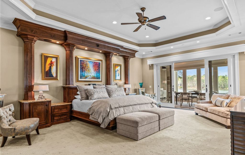 1461 North Shore Drive Home in Greensboro, Georgia. Discover unmatched luxury at this stunning family lake house near the Ritz and LakeClub. Enjoy expansive lake views, resort-style infinity pool, 4-car garage, spacious suites, two kitchens, and an elevator. 