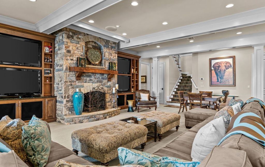 1461 North Shore Drive Home in Greensboro, Georgia. Discover unmatched luxury at this stunning family lake house near the Ritz and LakeClub. Enjoy expansive lake views, resort-style infinity pool, 4-car garage, spacious suites, two kitchens, and an elevator. 