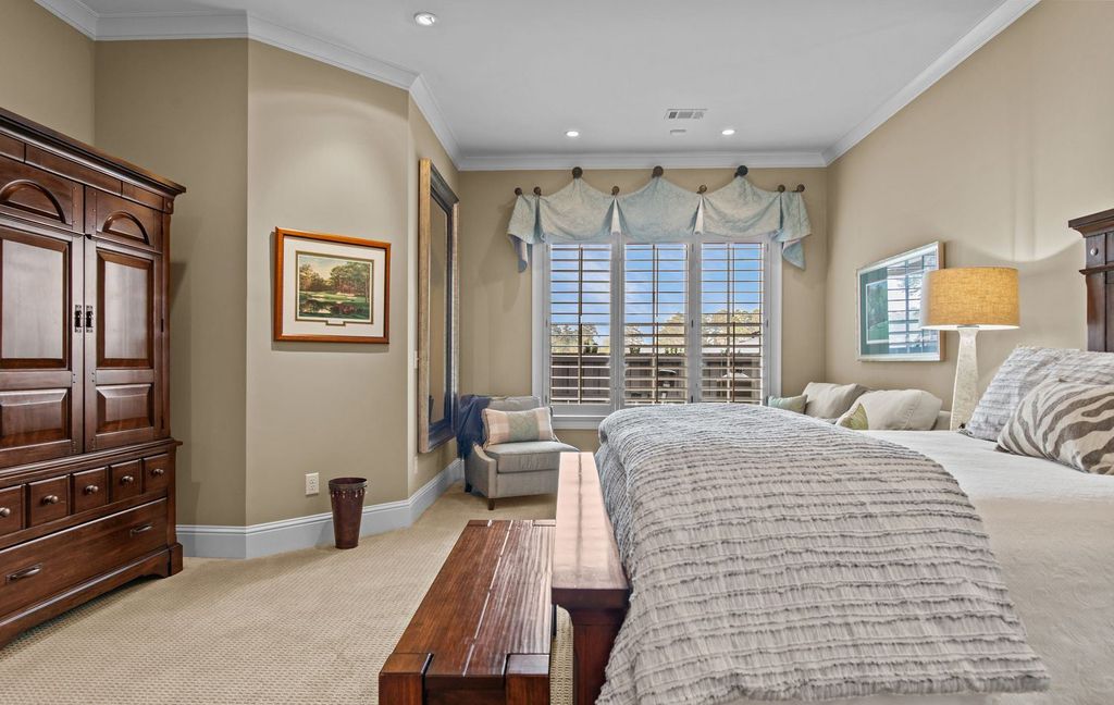1461 North Shore Drive Home in Greensboro, Georgia. Discover unmatched luxury at this stunning family lake house near the Ritz and LakeClub. Enjoy expansive lake views, resort-style infinity pool, 4-car garage, spacious suites, two kitchens, and an elevator. 