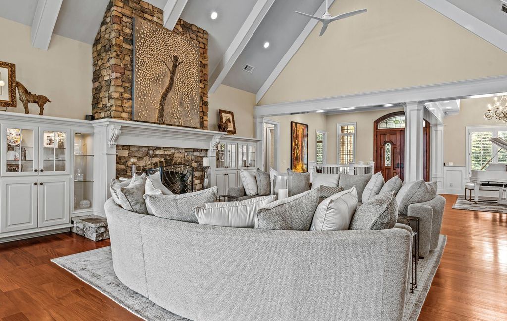 1461 North Shore Drive Home in Greensboro, Georgia. Discover unmatched luxury at this stunning family lake house near the Ritz and LakeClub. Enjoy expansive lake views, resort-style infinity pool, 4-car garage, spacious suites, two kitchens, and an elevator. 