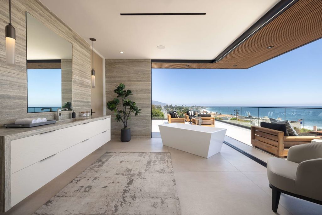 23917 Malibu Road Home in Malibu, California. Experience luxury coastal living in this contemporary masterpiece by architect Doug Burdge, located in the private and gated Malibu Colony Estates.