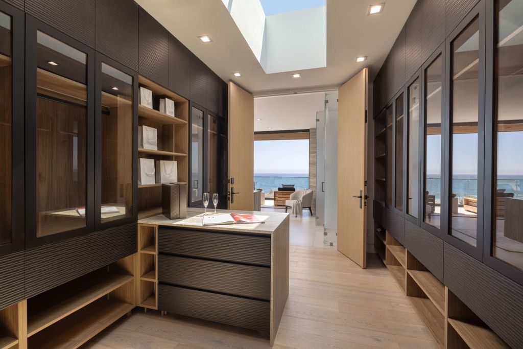 23917 Malibu Road Home in Malibu, California. Experience luxury coastal living in this contemporary masterpiece by architect Doug Burdge, located in the private and gated Malibu Colony Estates.