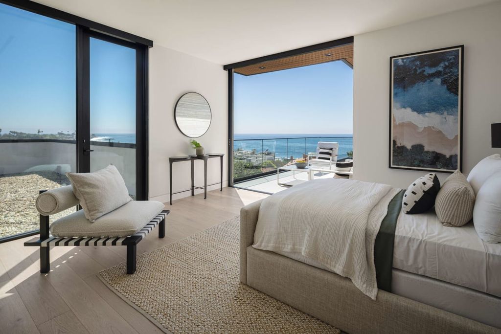 23917 Malibu Road Home in Malibu, California. Experience luxury coastal living in this contemporary masterpiece by architect Doug Burdge, located in the private and gated Malibu Colony Estates.