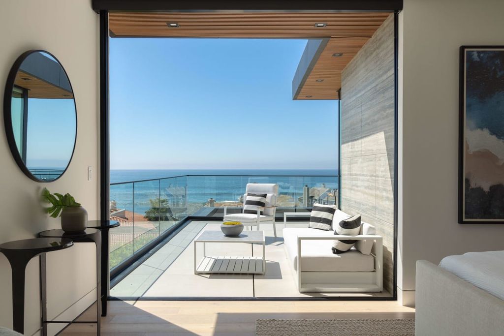 23917 Malibu Road Home in Malibu, California. Experience luxury coastal living in this contemporary masterpiece by architect Doug Burdge, located in the private and gated Malibu Colony Estates.
