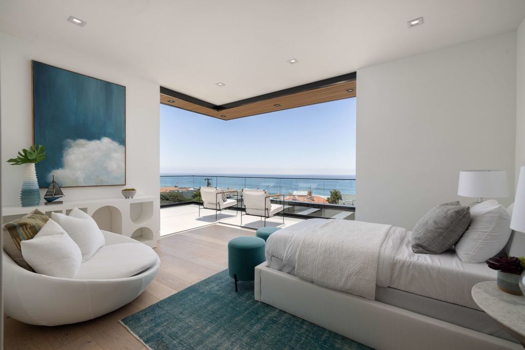 23917 Malibu Road Home in Malibu, California. Experience luxury coastal living in this contemporary masterpiece by architect Doug Burdge, located in the private and gated Malibu Colony Estates.