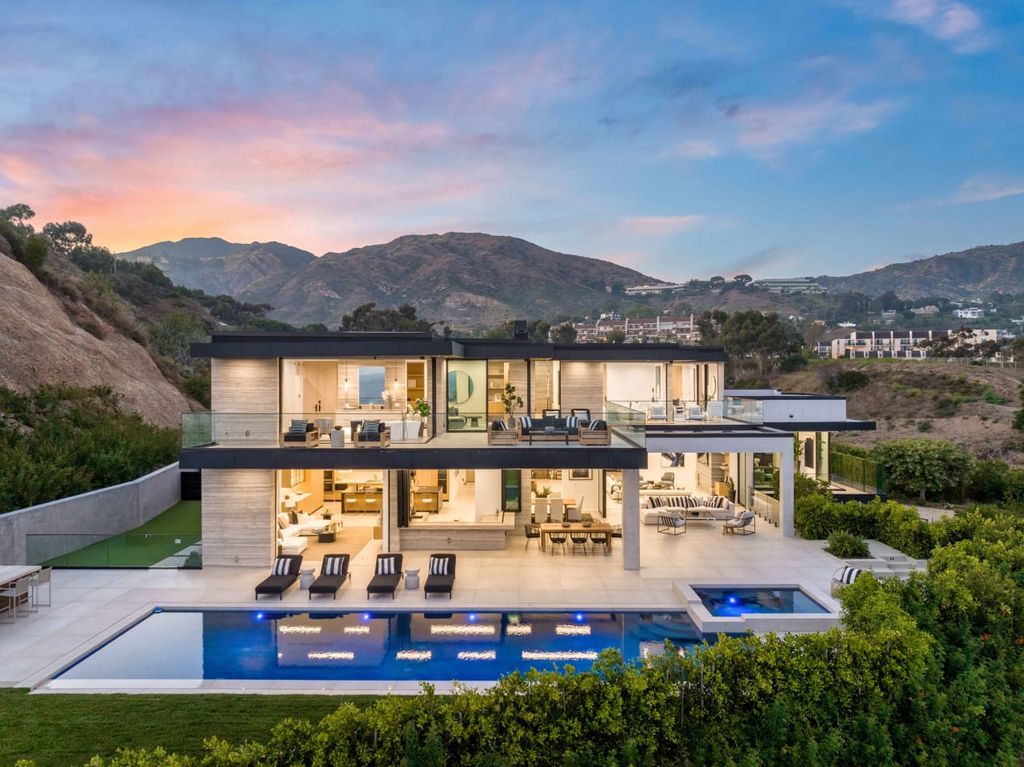 23917 Malibu Road Home in Malibu, California. Experience luxury coastal living in this contemporary masterpiece by architect Doug Burdge, located in the private and gated Malibu Colony Estates.