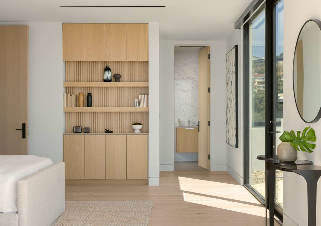 23917 Malibu Road Home in Malibu, California. Experience luxury coastal living in this contemporary masterpiece by architect Doug Burdge, located in the private and gated Malibu Colony Estates.