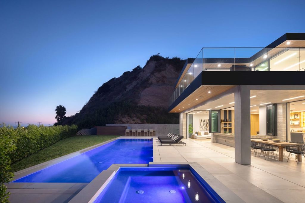 23917 Malibu Road Home in Malibu, California. Experience luxury coastal living in this contemporary masterpiece by architect Doug Burdge, located in the private and gated Malibu Colony Estates.