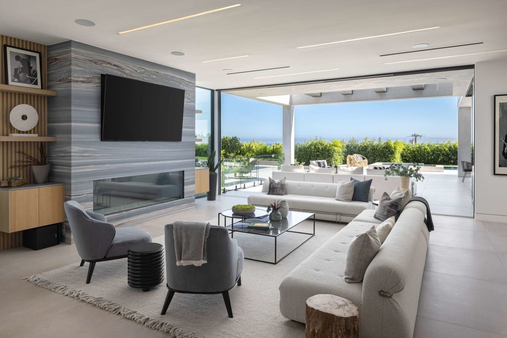 23917 Malibu Road Home in Malibu, California. Experience luxury coastal living in this contemporary masterpiece by architect Doug Burdge, located in the private and gated Malibu Colony Estates.