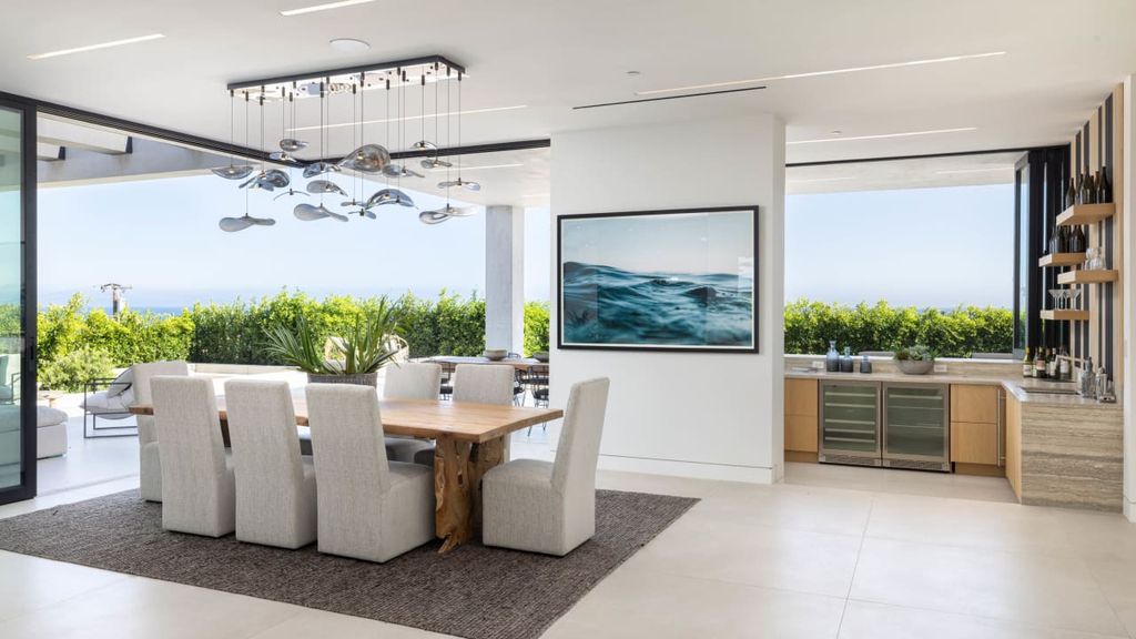 23917 Malibu Road Home in Malibu, California. Experience luxury coastal living in this contemporary masterpiece by architect Doug Burdge, located in the private and gated Malibu Colony Estates.