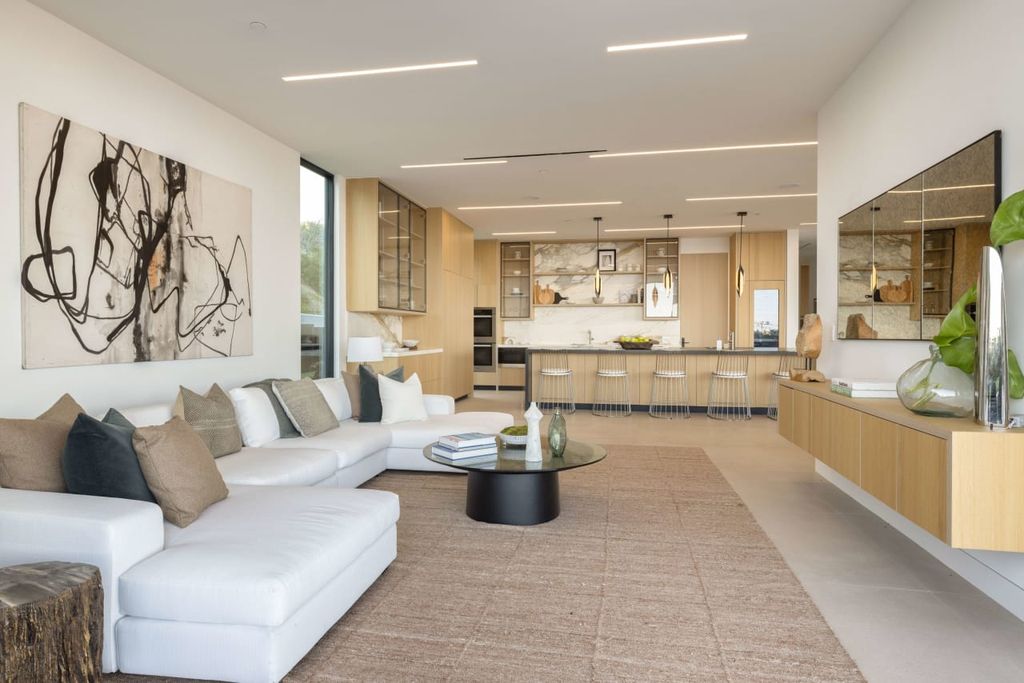 23917 Malibu Road Home in Malibu, California. Experience luxury coastal living in this contemporary masterpiece by architect Doug Burdge, located in the private and gated Malibu Colony Estates.