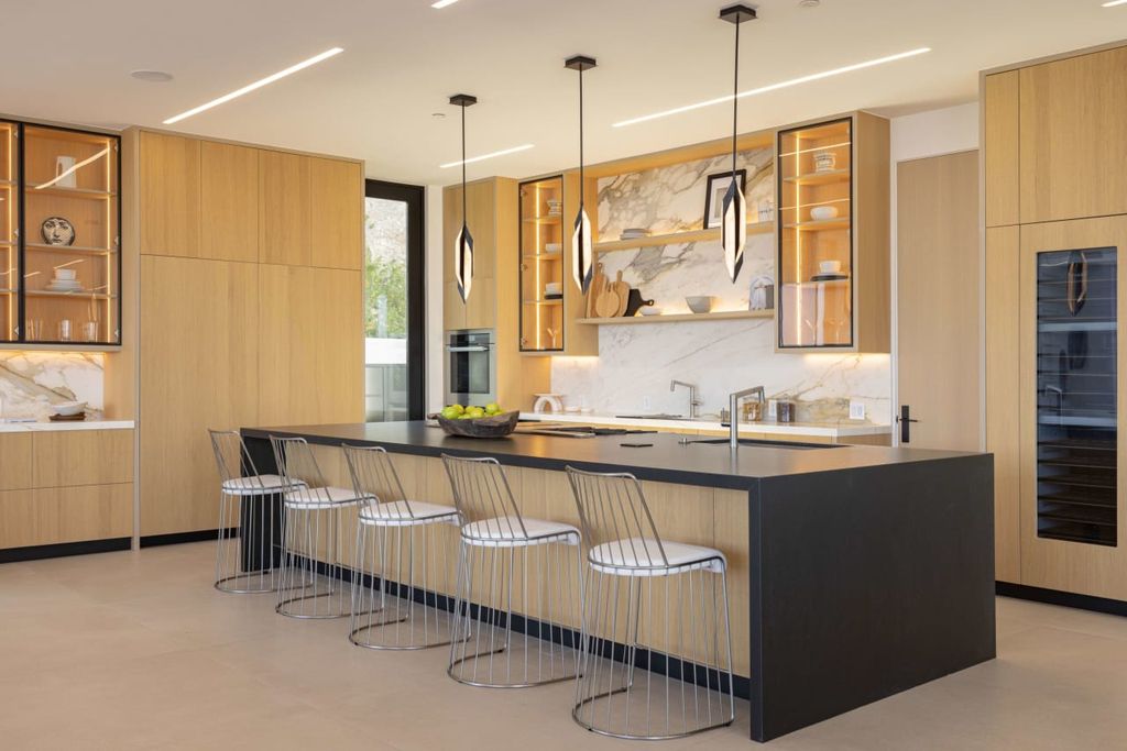 23917 Malibu Road Home in Malibu, California. Experience luxury coastal living in this contemporary masterpiece by architect Doug Burdge, located in the private and gated Malibu Colony Estates.