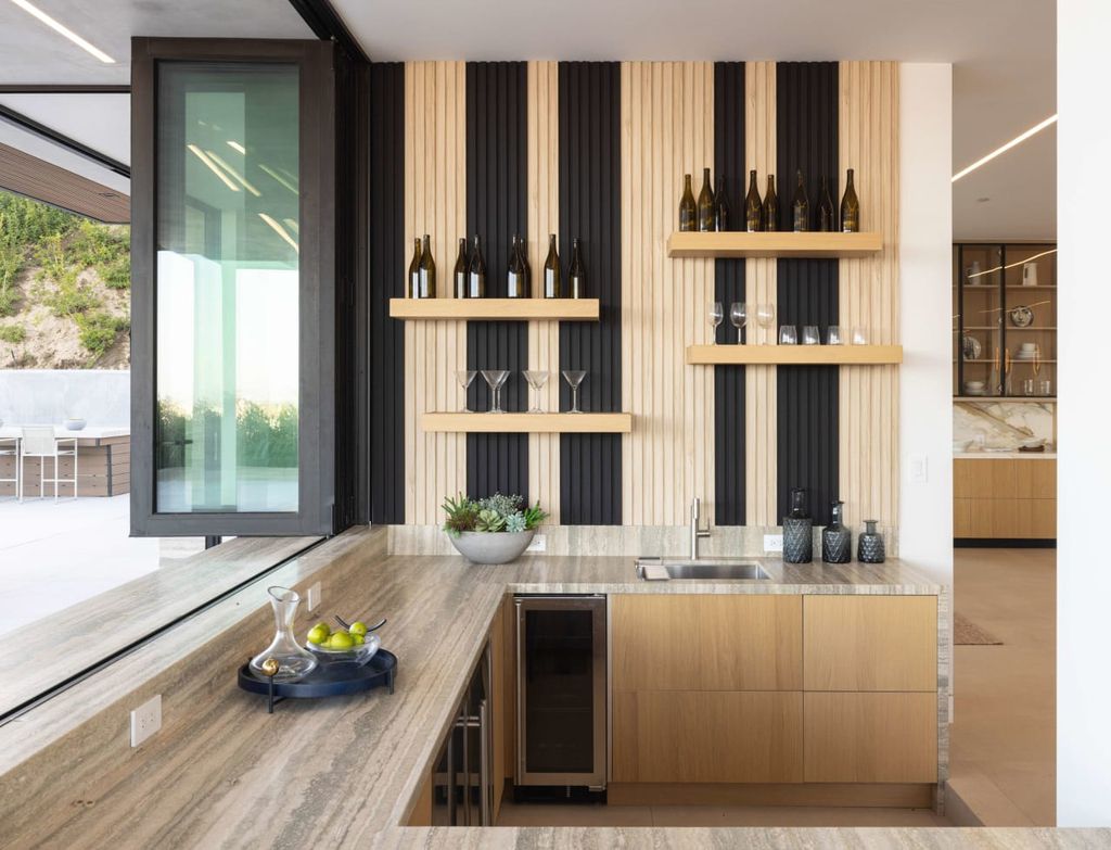 23917 Malibu Road Home in Malibu, California. Experience luxury coastal living in this contemporary masterpiece by architect Doug Burdge, located in the private and gated Malibu Colony Estates.