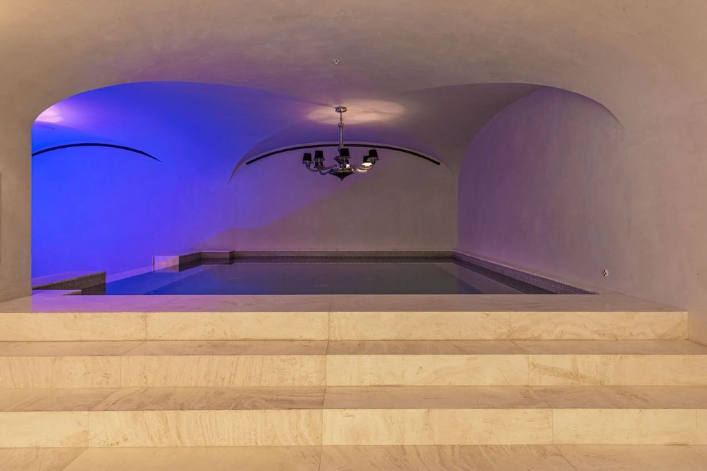 271 South Mapleton Drive Home in Los Angeles, California. Welcome to 'Il Magione' on South Mapleton Dr, Los Angeles' most prestigious address. Spanning 31,450 square feet on 1.4 flat acres, this luxury compound boasts Fendi furnishings, a bowling alley, movie theatre, gym, wine cellar, indoor pool, and more. 